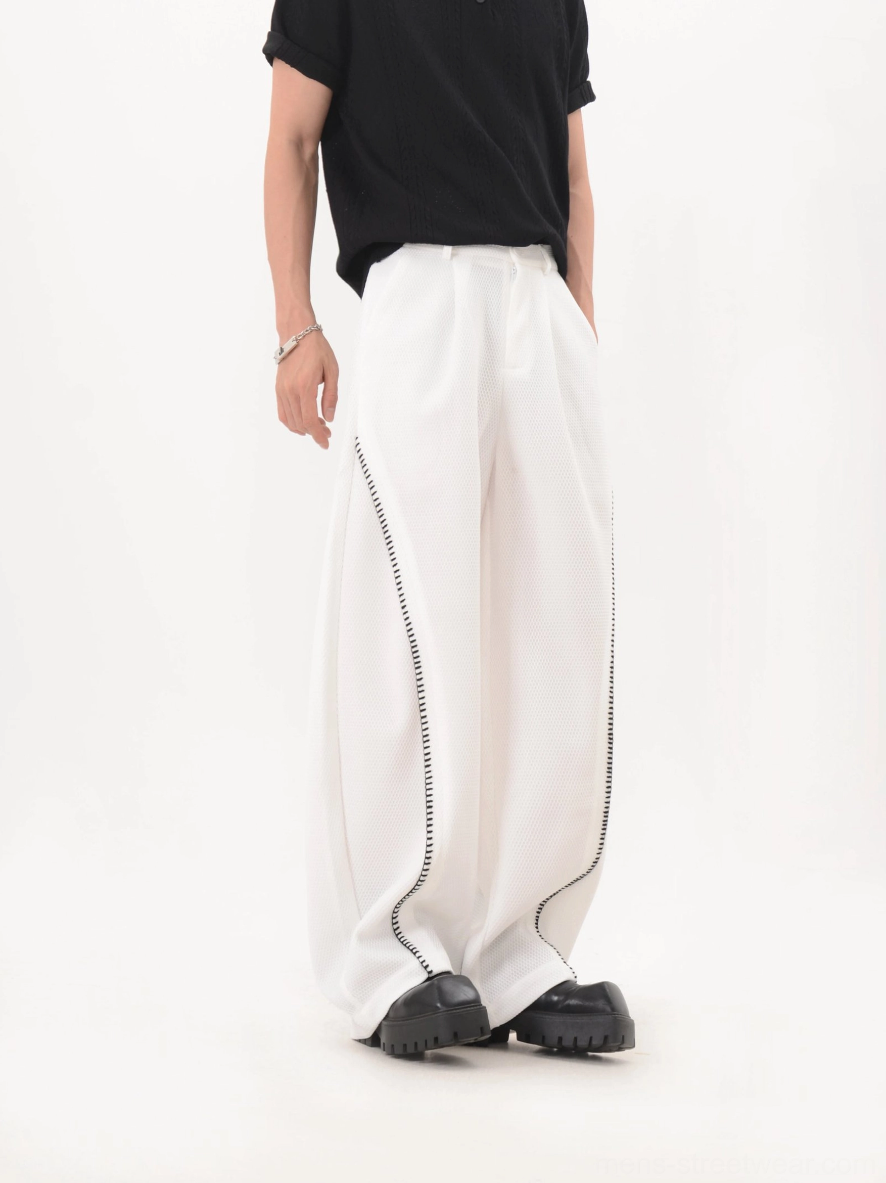 Curve trim mesh texture wide leg techwear trousers detailed product view