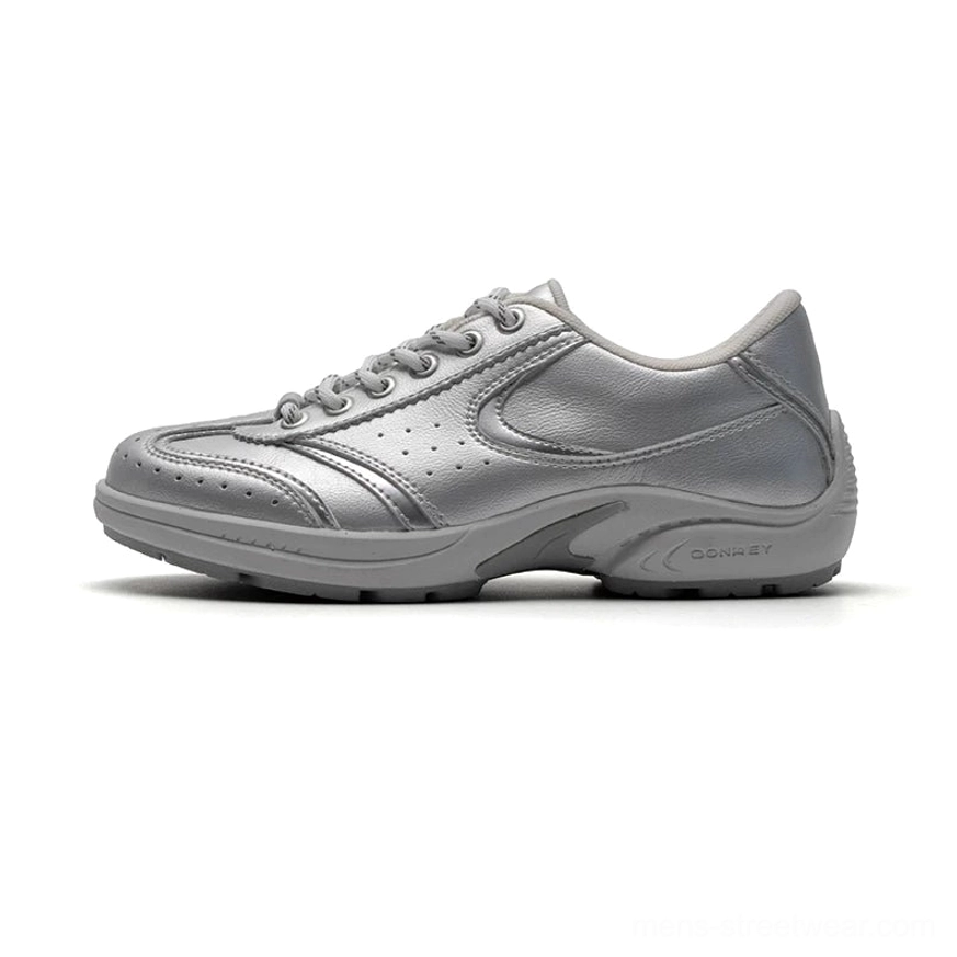 Metallic silver CurveLine retro court sneakers with smooth leather upper, perforated details, and low-profile rubber outsole