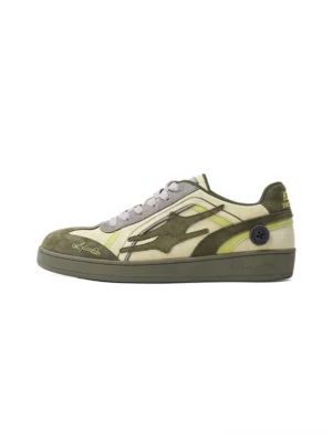 Cyan green low-profile retro sneakers shown from the left side with layered suede panels, flame-inspired stitching, contrast details, and a flat rubber outsole