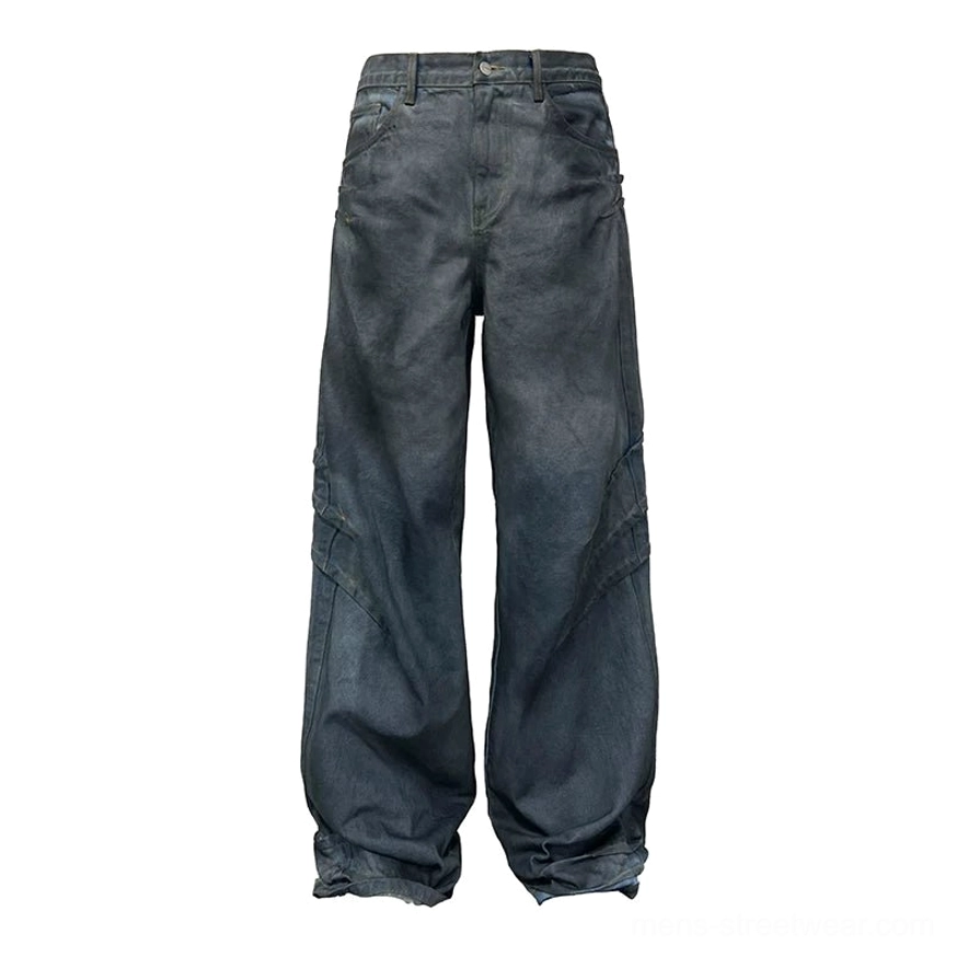 Dark blue distressed stacked wide-leg jeans with sculpted 3d seams and vintage washed streetwear finish