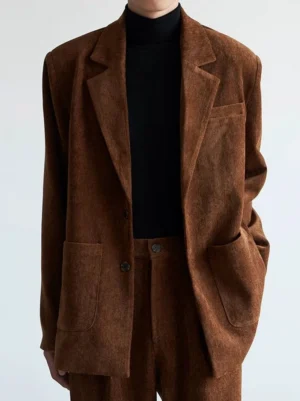 Dark brown corduroy blazer and matching wide-leg trouser set with notch lapels, two-button closure, and patch pockets