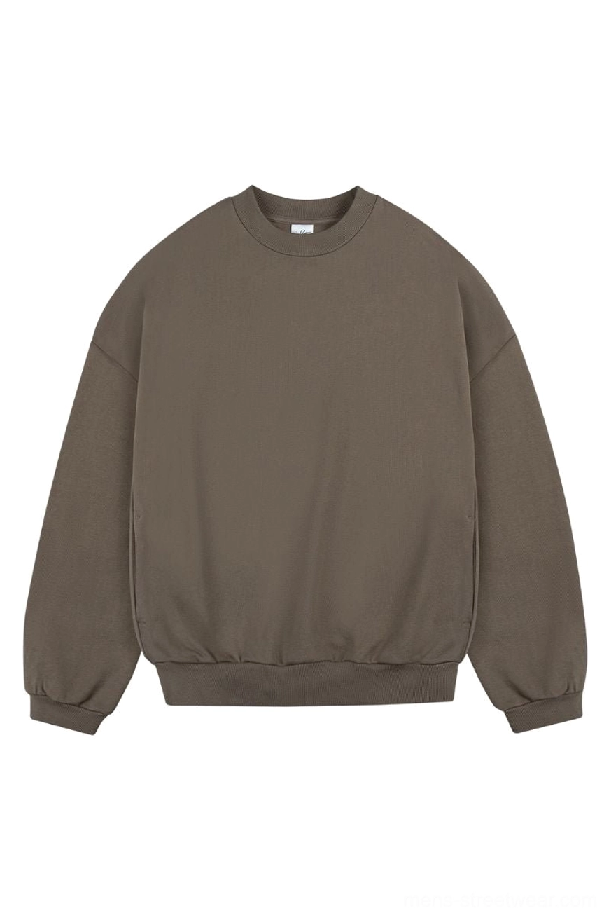 Dark brown minimalist long sleeve sweatshirt with ribbed cuffs and hem for relaxed Korean streetwear styling