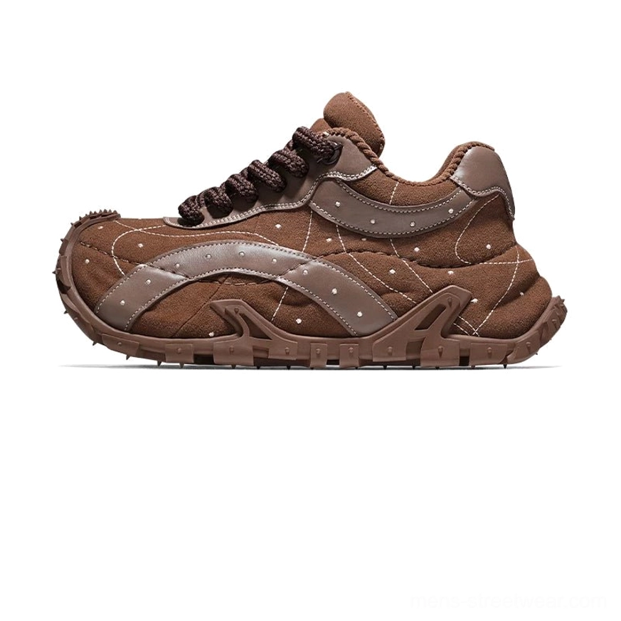 Dark brown TrailGrid chunky sneakers from rear three-quarter view with quilted upper, leather overlays and multi-terrain outsole