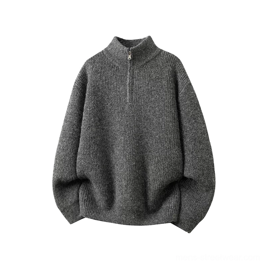 Dark charcoal oversized half-zip mock neck knit sweater with vertical ribbed texture and metal zipper minimalist streetwear design