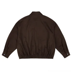 Back flat lay view of the dark coffee cotton Harrington jacket showing its minimalist back, relaxed dropped-shoulder fit, elasticated hem, and adjustable cuffs