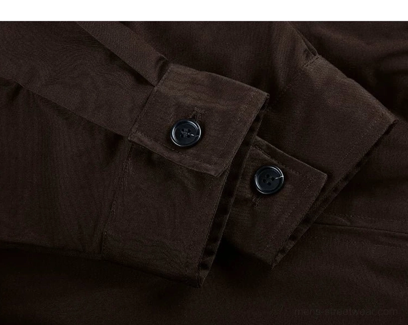 Dark coffee brown Harrington jacket cuff detail showing two button-adjustable fasteners, cotton twill texture, and clean tailored seams