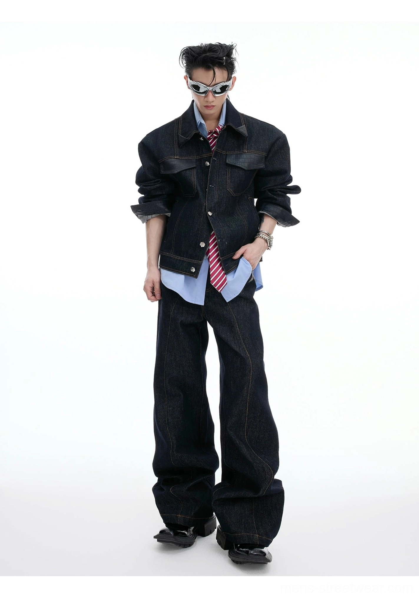 Full-body front styling of a dark denim jacket and relaxed wide-leg trousers layered with a shirt and red striped tie for modern Korean streetwear