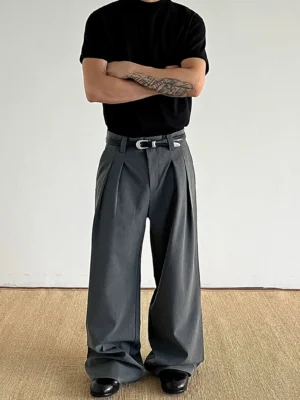 Dark gray double-pleated wide-leg trousers with a silver buckle belt styled for modern Korean streetwear front full-body view