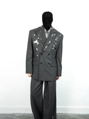 Full-body view of dark gray embroidered two-piece streetwear suit with matching blazer and wide-leg trousers