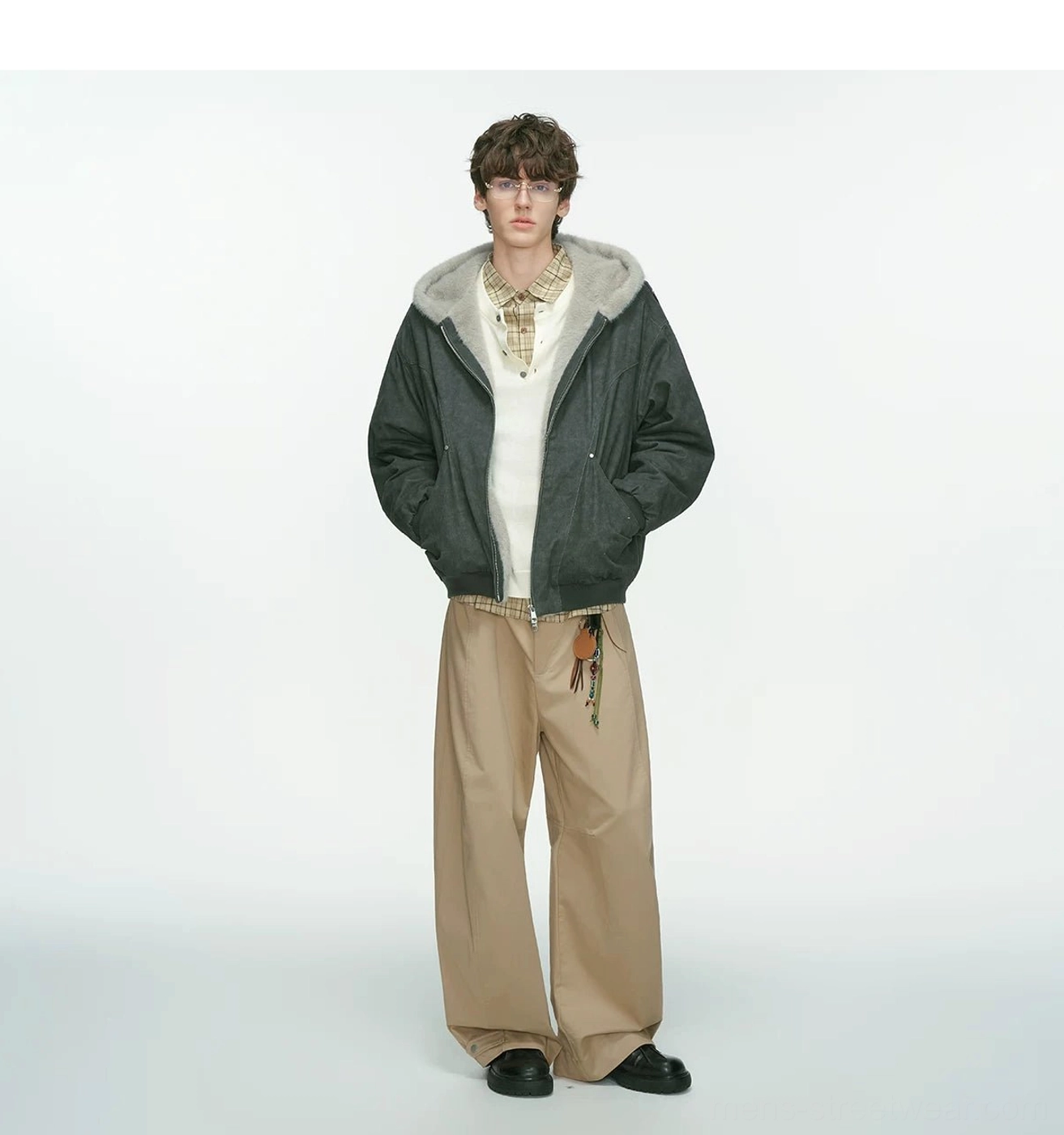 Dark gray faux-shearling lined hooded bomber jacket front view with side pockets and ribbed waistband