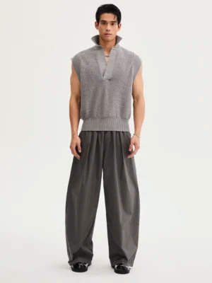 Dark gray Korean streetwear wide-leg drawstring trousers shown from the front with pleated waist and tailored drape