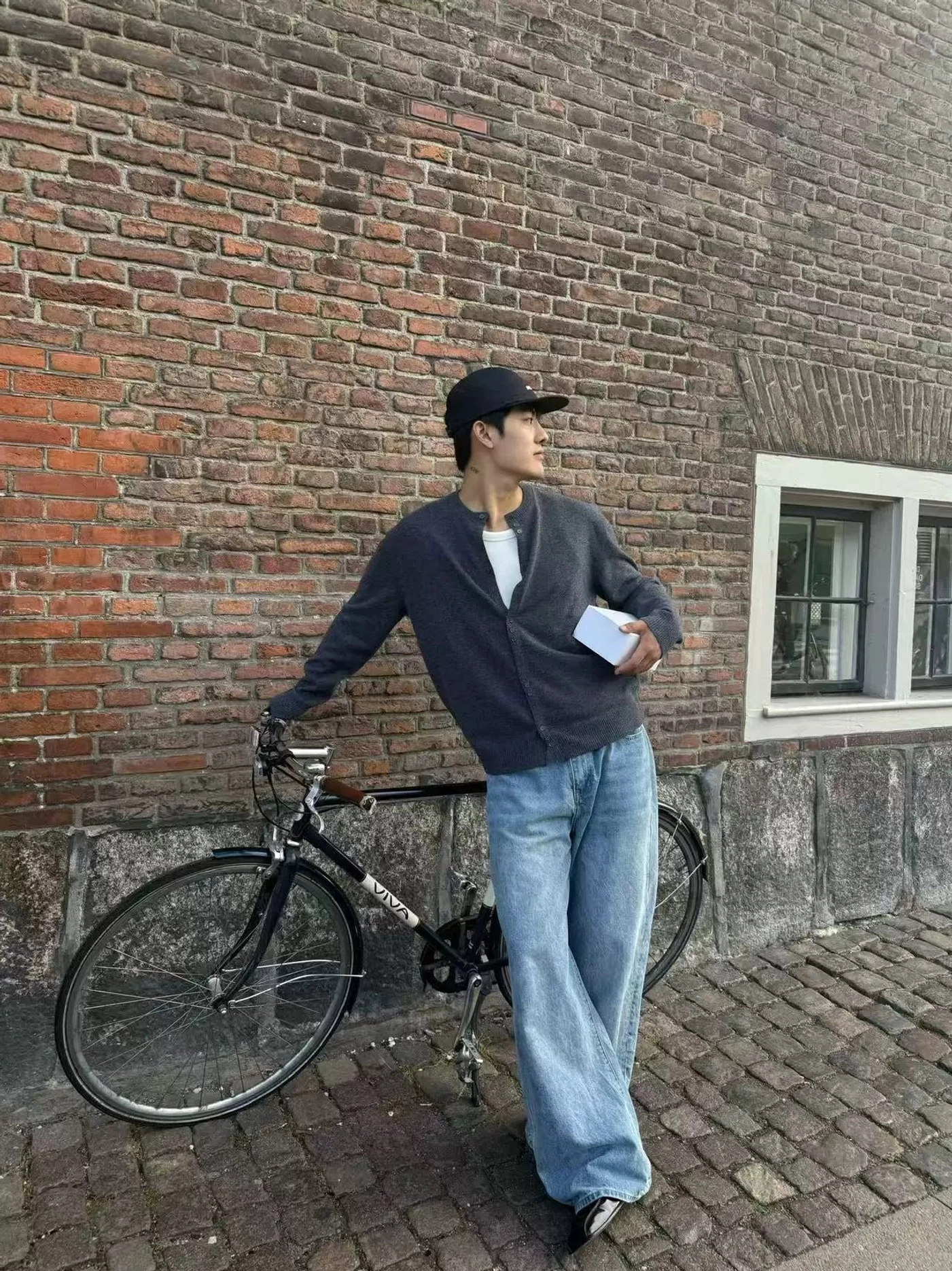 Dark gray lambswool henley knit cardigan alternate image showing button front and relaxed East Asian streetwear fit