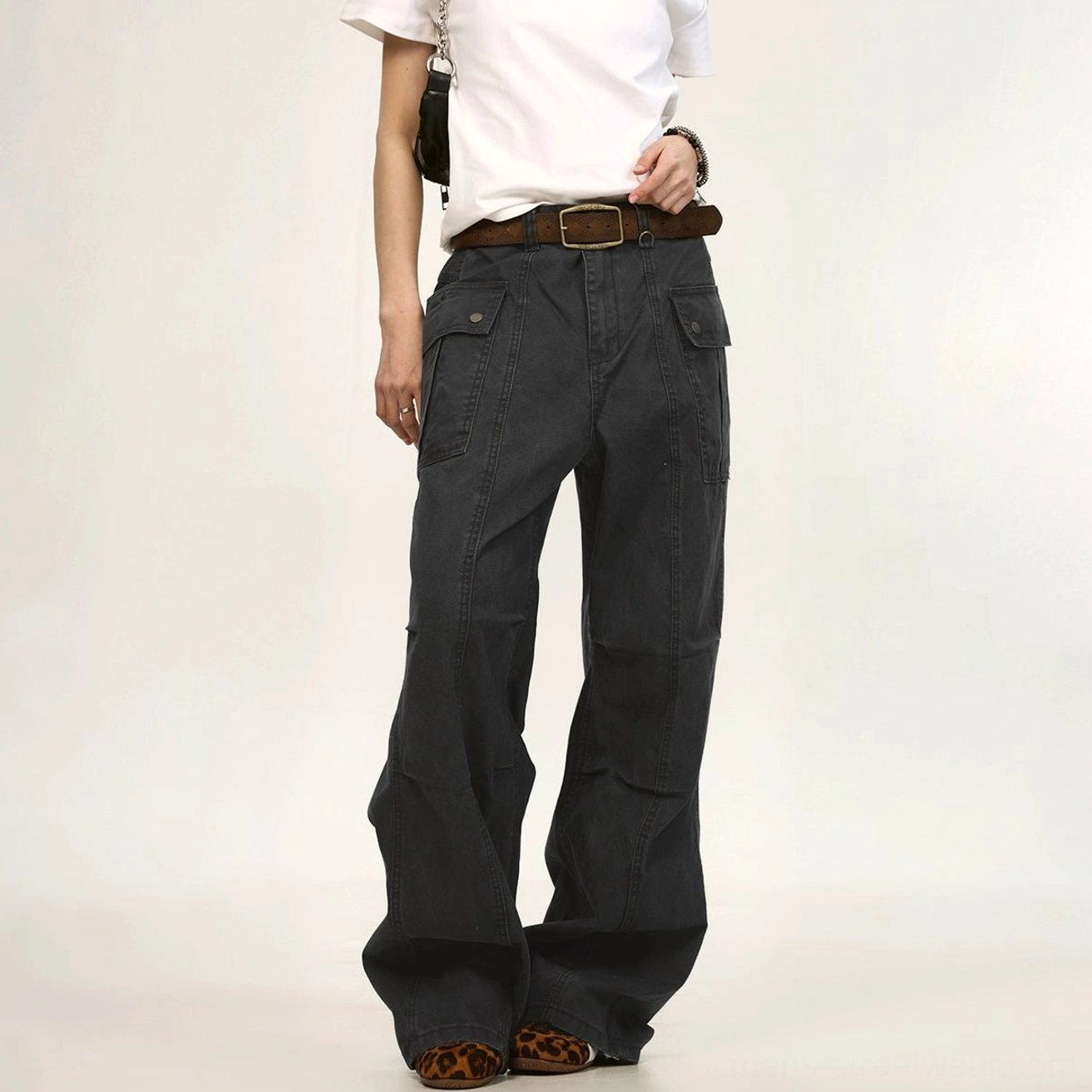 Dark gray low rise wide leg cargo pants full front view in relaxed unisex urban streetwear styling