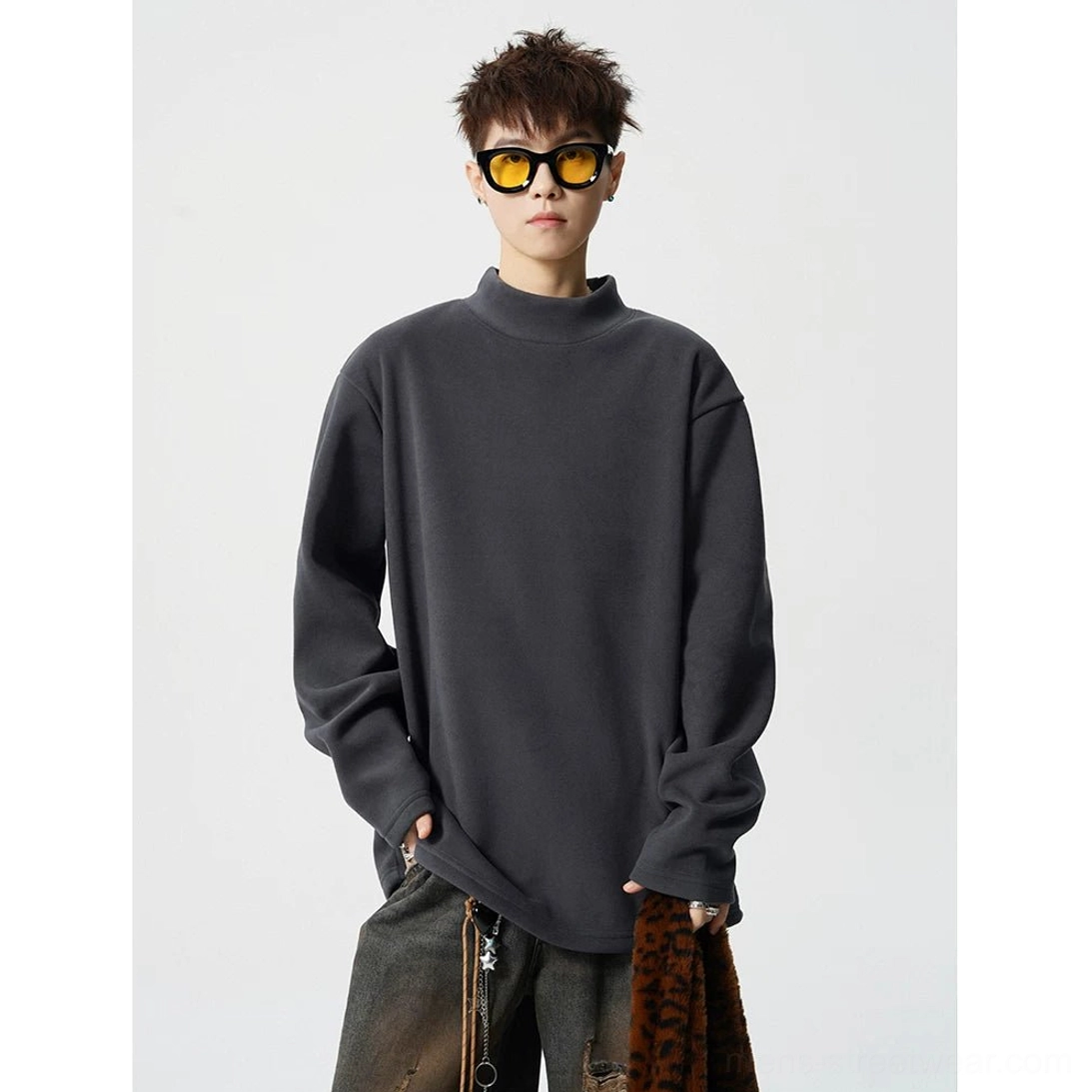 Dark grey relaxed boxy mock neck fleece top with dropped shoulders and baggy denim streetwear styling