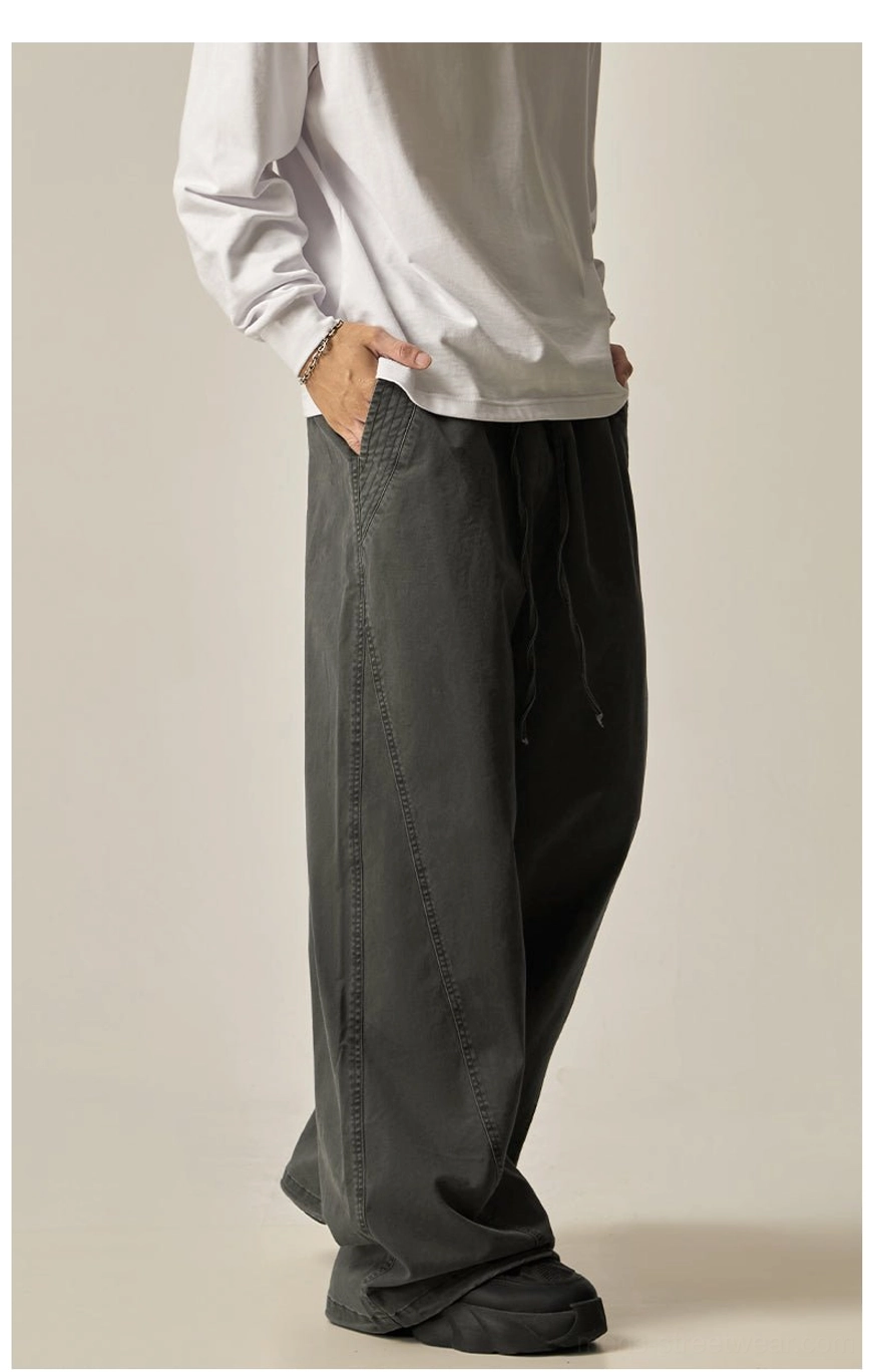 Dark grey drawstring wide-leg pants front view relaxed fit contemporary korean fashion east asian streetwear aesthetic
