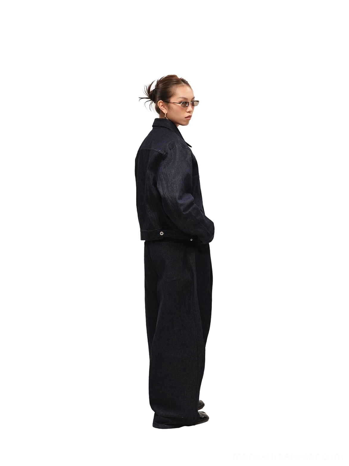 Side view of dark indigo cropped denim jacket in a minimalist Korean streetwear outfit