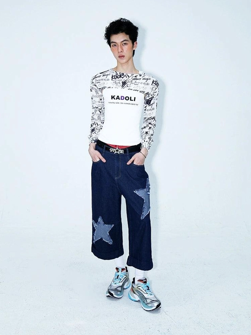 Dark indigo star patch denim culottes product image showing the cropped wide-leg streetwear silhouette and distinctive appliqué details