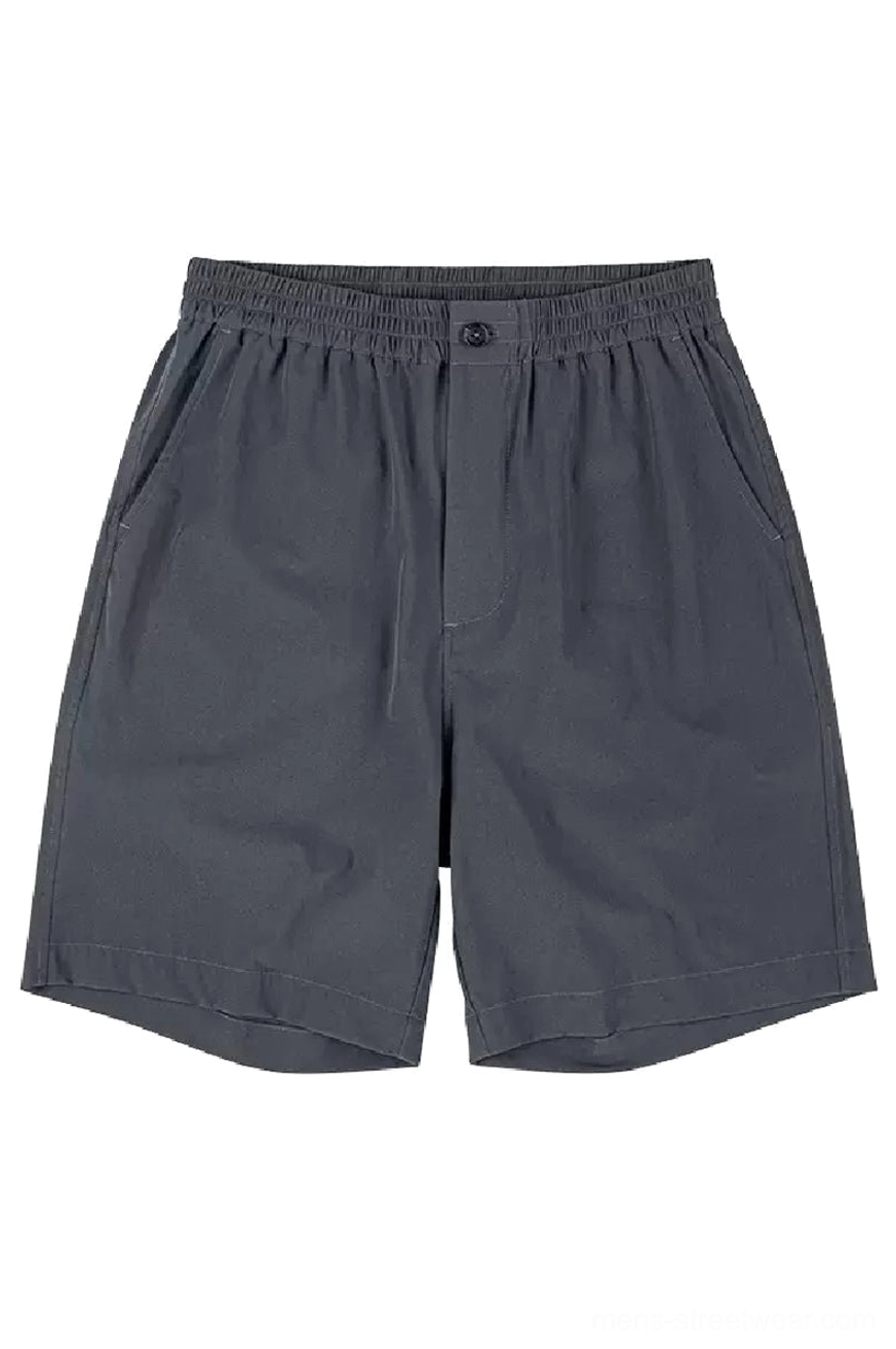 Dark slate gray 320GSM cotton outdoor tech shorts front flat view with elastic waistband side pockets and rolled hems