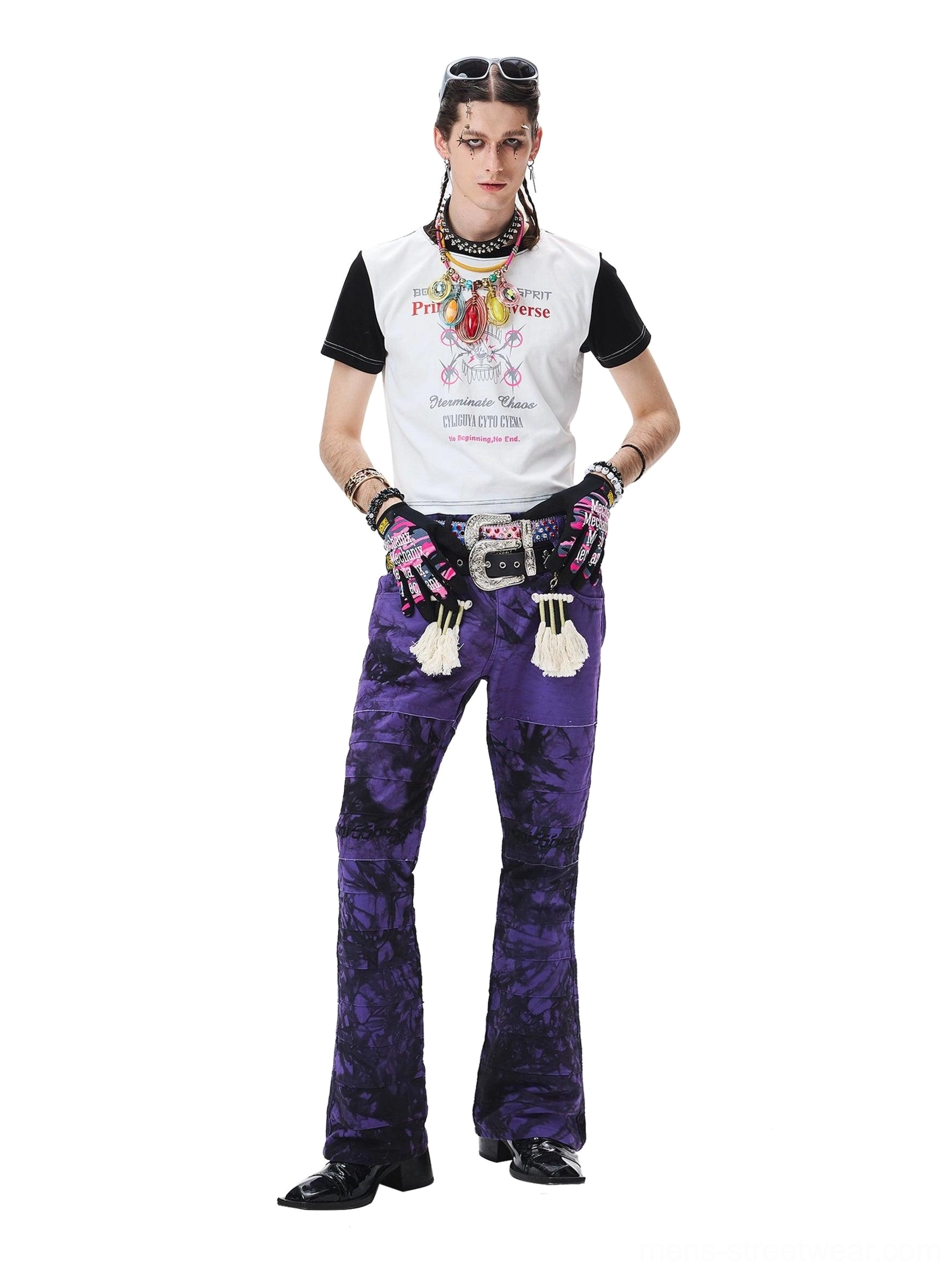 Deconstructed purple tie-dye trousers with distressed fringe accents and expressive avant-garde details