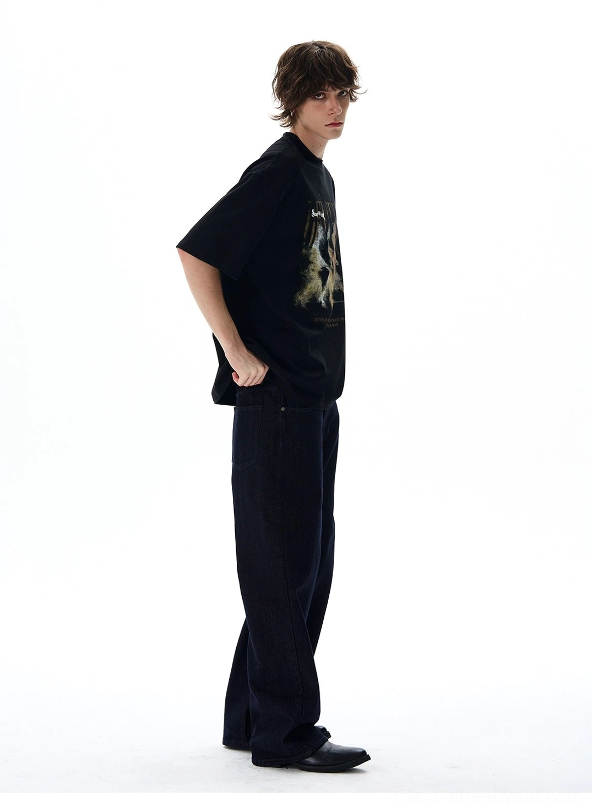 Black Dense Fog oversized vintage graphic t-shirt side view showing loose streetwear silhouette