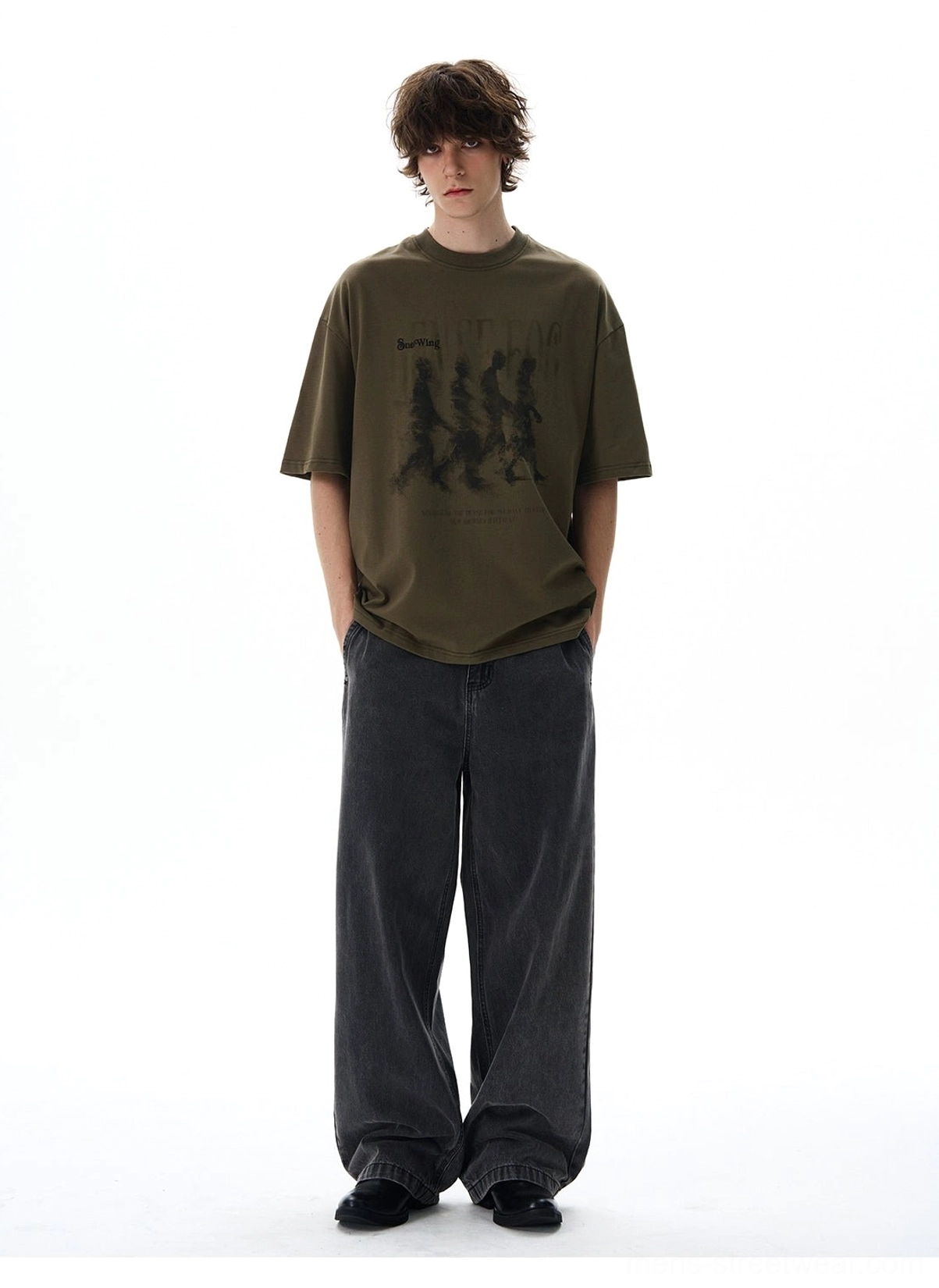 Green Dense Fog vintage graphic oversized streetwear tee front view with dark wide-leg jeans