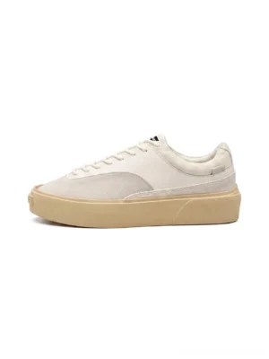 Desert Gray platform canvas trainers with layered textile upper and vintage cream platform sole side studio view