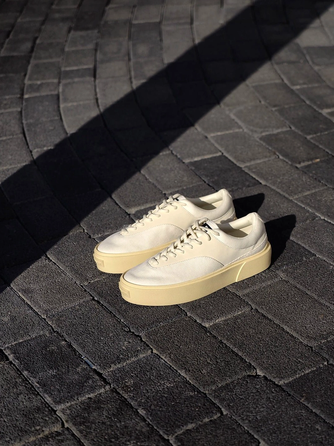 Desert Gray platform canvas trainers overhead outdoor view showing side profile and textured outsole