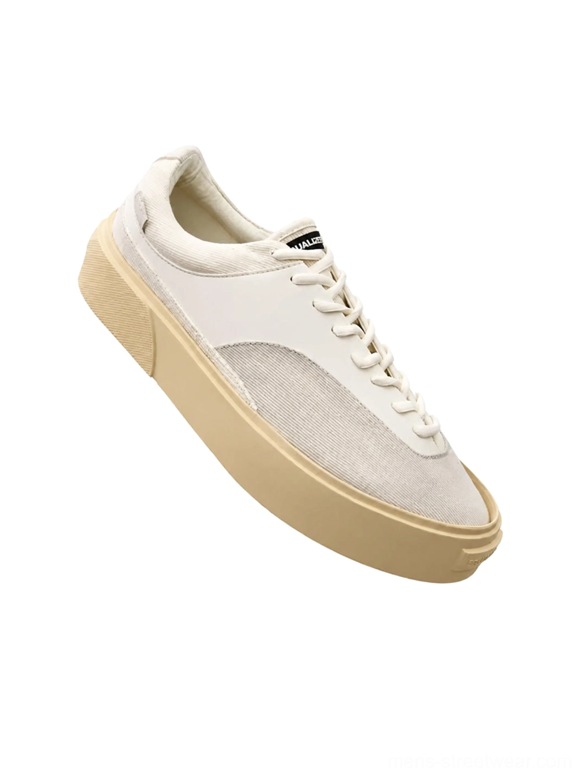 Angled studio close-up of Desert Gray platform canvas trainers with suede-look toe panel and cream sole