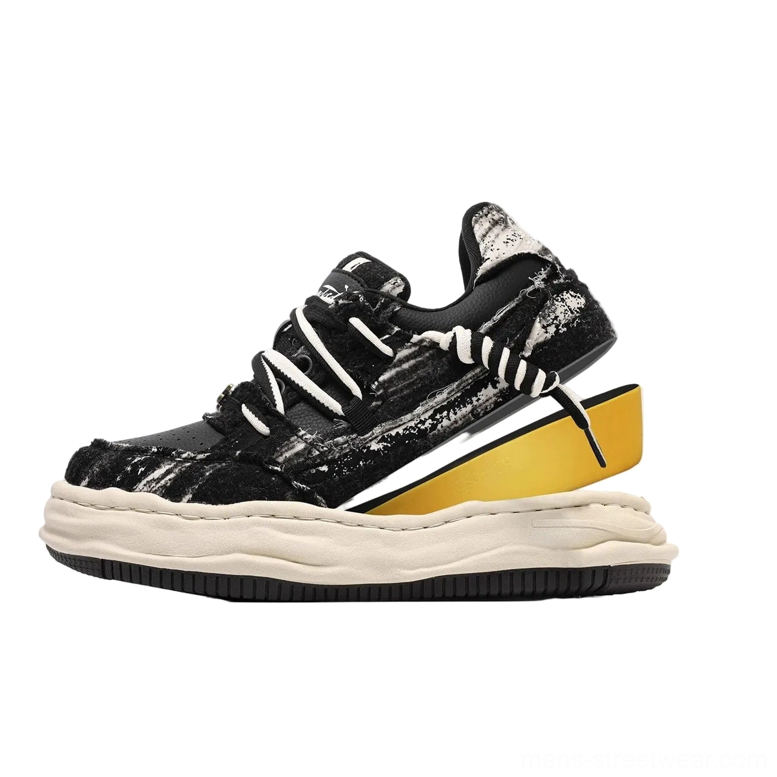 Black and white distressed canvas platform skate sneaker side profile showing layered sole construction