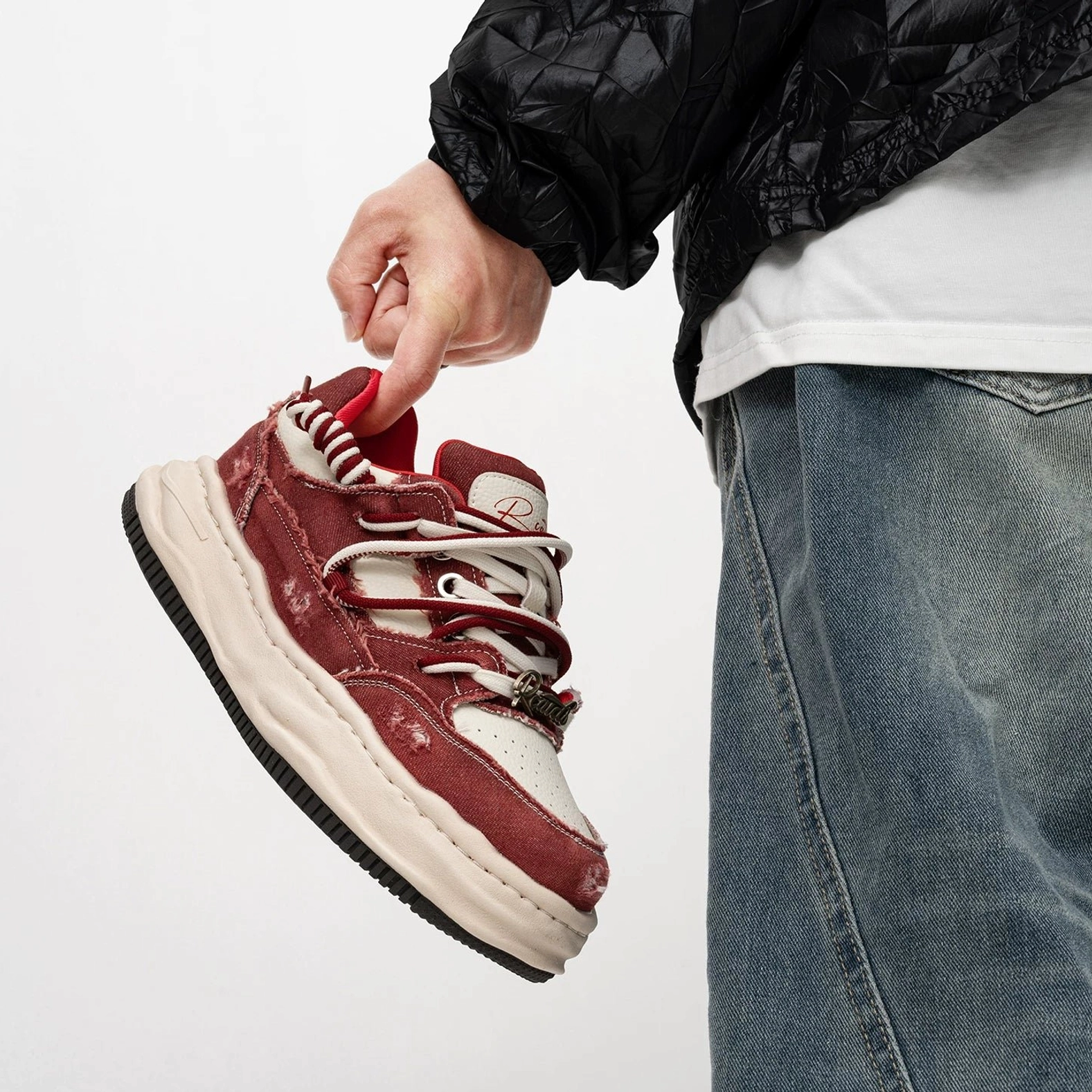 Red and white retro distressed canvas platform skate sneaker with dual laces and tongue label detail