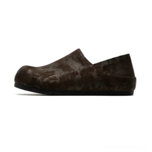 Distressed dark brown retro suede clogs with collapsible heel, rounded toe, and matte black outsole for streetwear styling