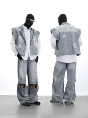 Front and back view of oversized distressed denim vest and wide-leg jeans set in faded vintage blue streetwear style