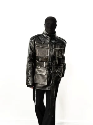 Three-quarter view of distressed faux leather belted utility jacket with cargo pockets and relaxed streetwear fit