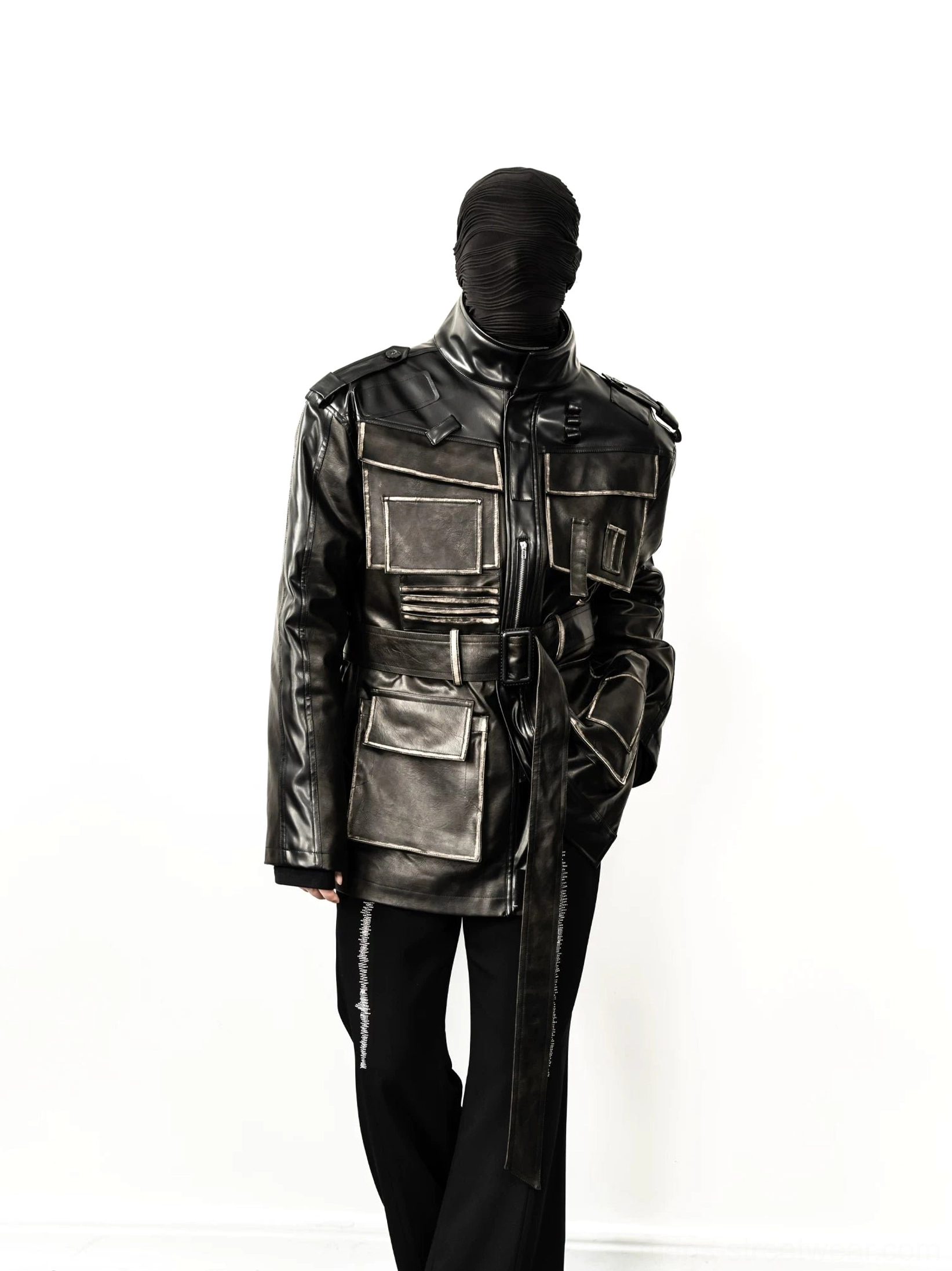Three-quarter view of distressed faux leather belted utility jacket with cargo pockets and relaxed streetwear fit