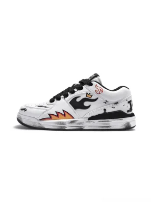 White low-top court sneaker with bold black flame graphic, crown graffiti artwork, distressed black midsole edge, and black laces