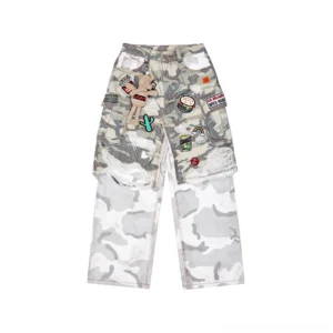 Front view of distressed gray camouflage patchwork cargo pants with oversized side pockets, frayed details, embroidered accents, and relaxed wide-leg streetwear fit