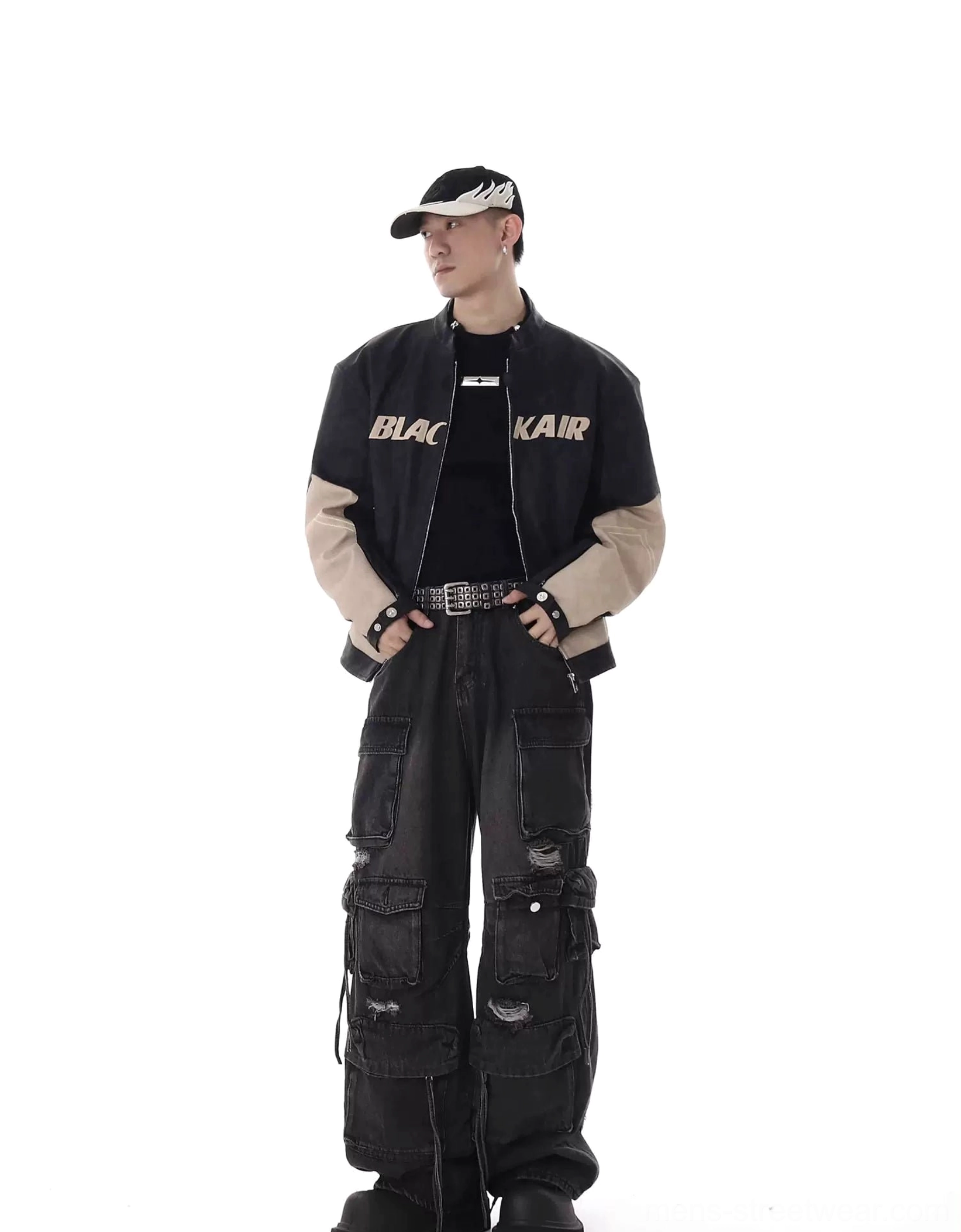 Black distressed multi-pocket cargo jeans side outfit view with baggy wide legs ripped denim and drawstring details