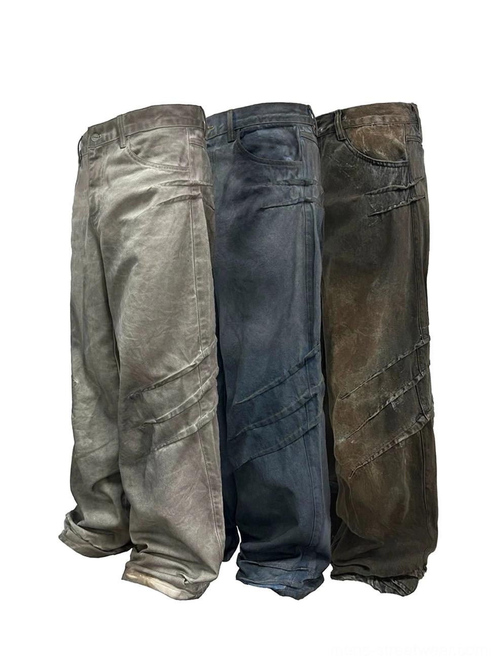 Distressed stacked wide-leg jeans in multiple vintage faded denim washes shown in front flat lay view