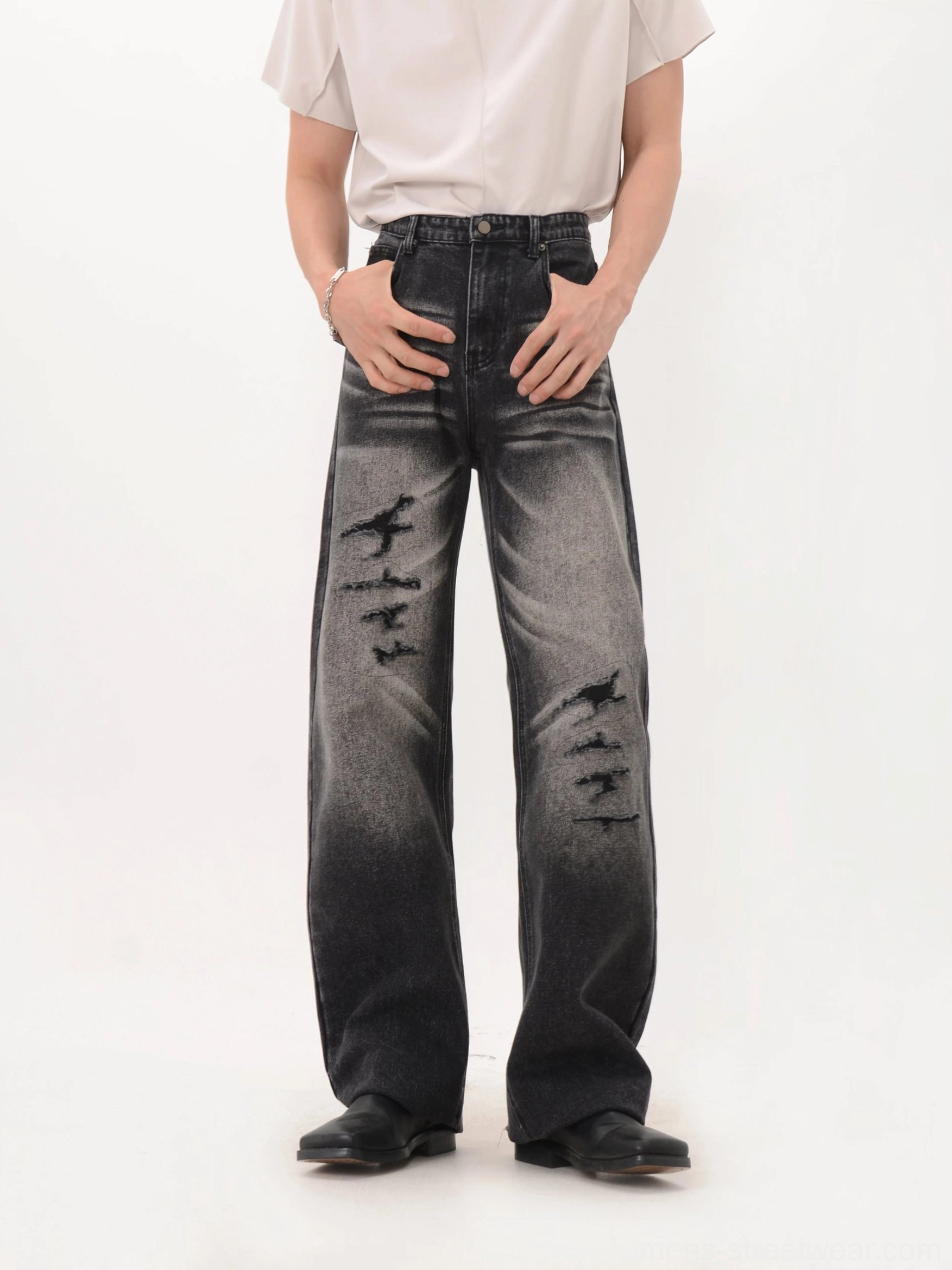 Charcoal black ripped wide-leg denim jeans with faded wash and loose high-waisted streetwear fit