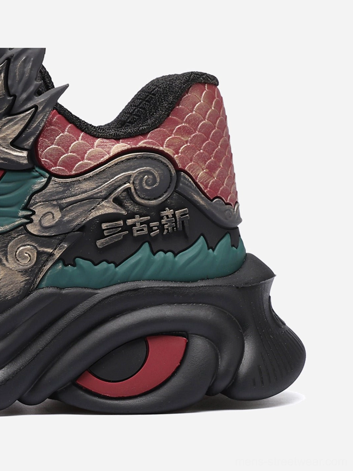 Black dragon crest chunky runner sneakers with futuristic wave outsole and contrast red teal streetwear accents