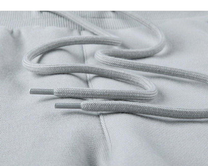 Gorpcore aesthetic drawstring shorts outdoor inspired styling technical fusion contemporary streetwear movement influence design