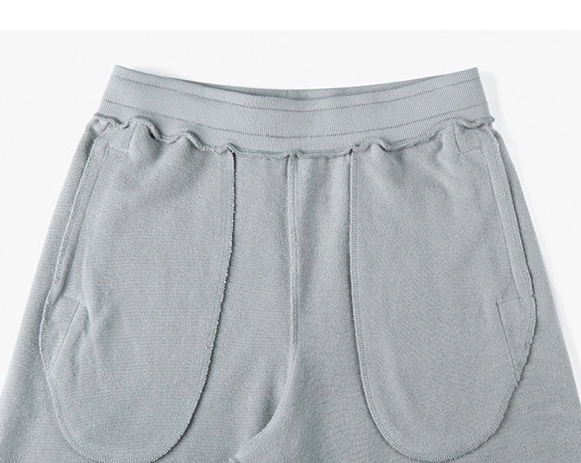 Capsule wardrobe essential drawstring shorts foundational basic piece versatile combination layering potential minimum outfit building