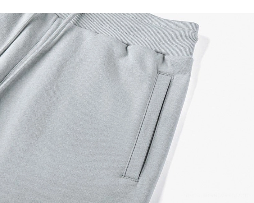Styling inspiration oversized drawstring shorts minimalist streetwear aesthetic layering versatility contemporary urban fashion lookbook