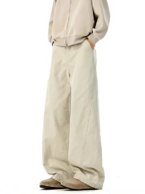 Cream beige wide-leg denim trousers front full-length view, neutral streetwear casual style