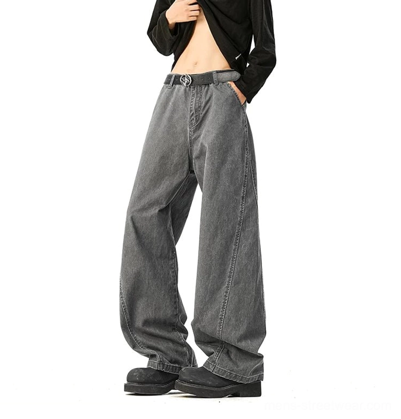 Faded grey wide-leg denim back standing view rear patch pocket relaxed fit texture