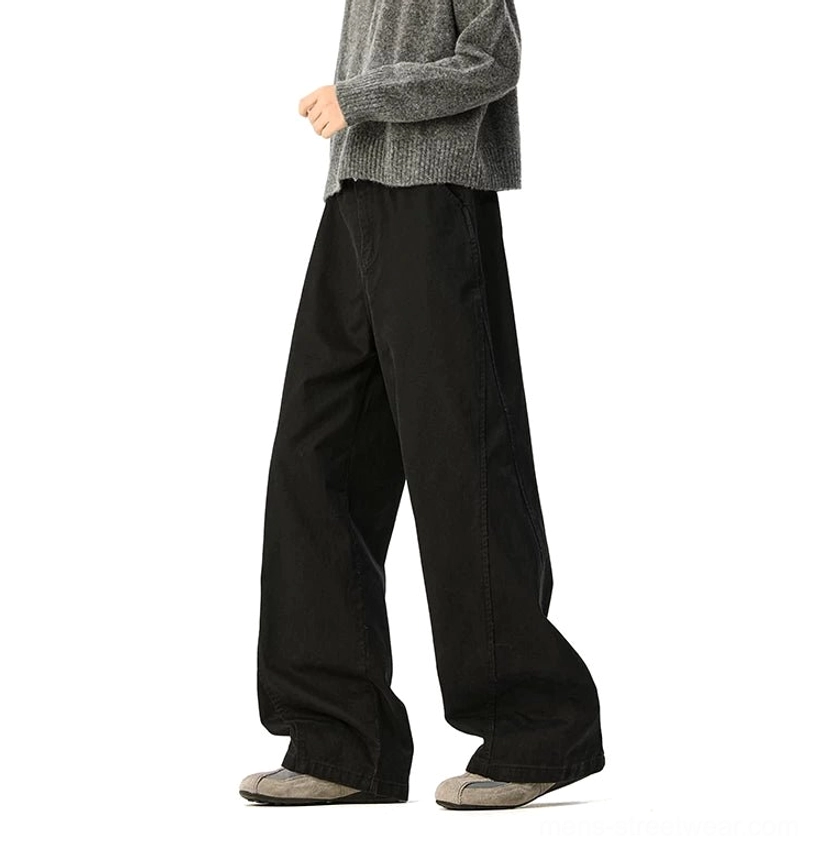 Ultra-wide denim trousers detail shot vertical panel seams clean front design streetwear