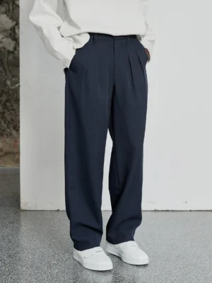 Navy blue double-pleated wide-leg dress pants with high waist and tailored streetwear silhouette