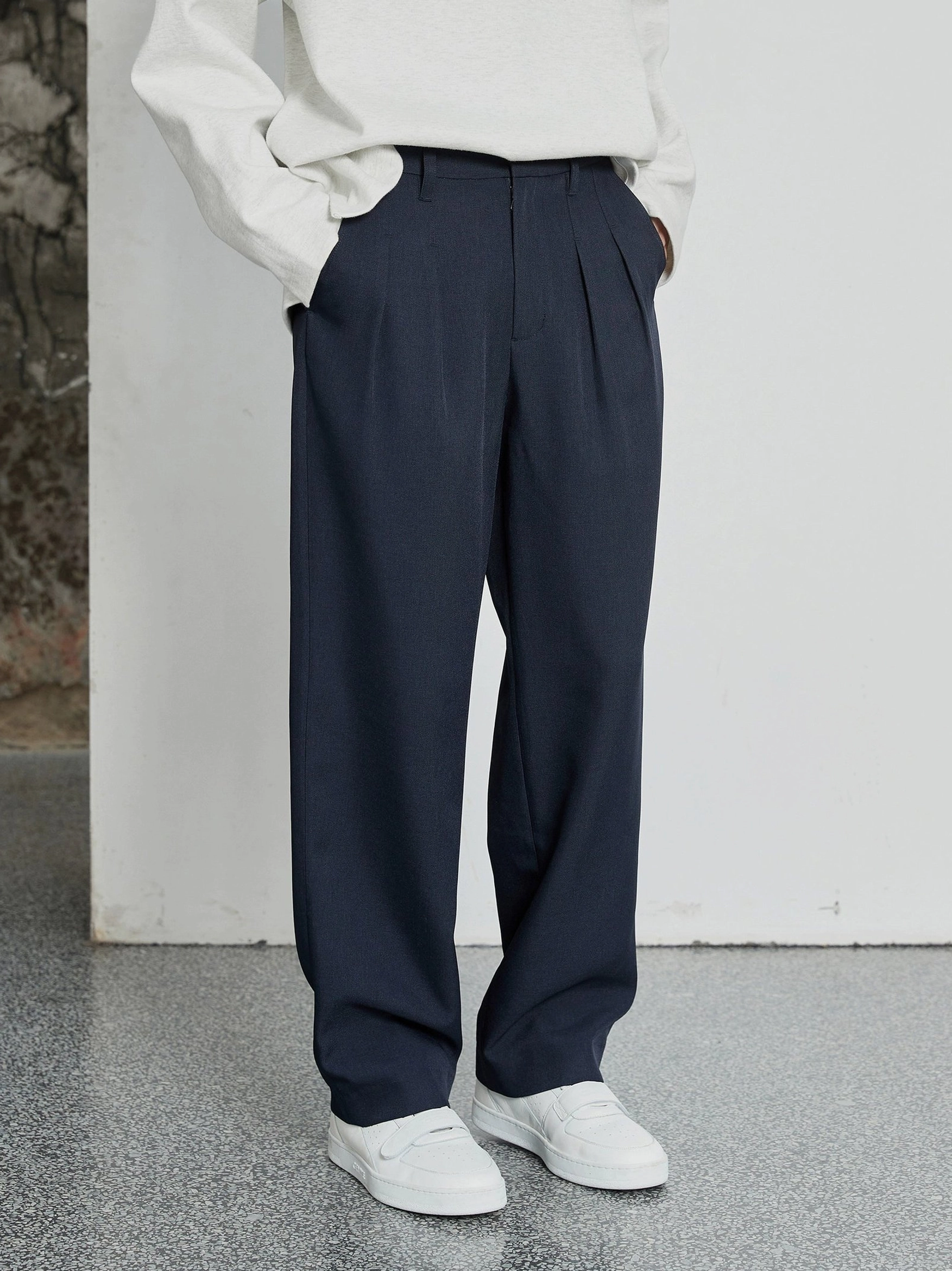 Navy blue double-pleated wide-leg dress pants with high waist and tailored streetwear silhouette