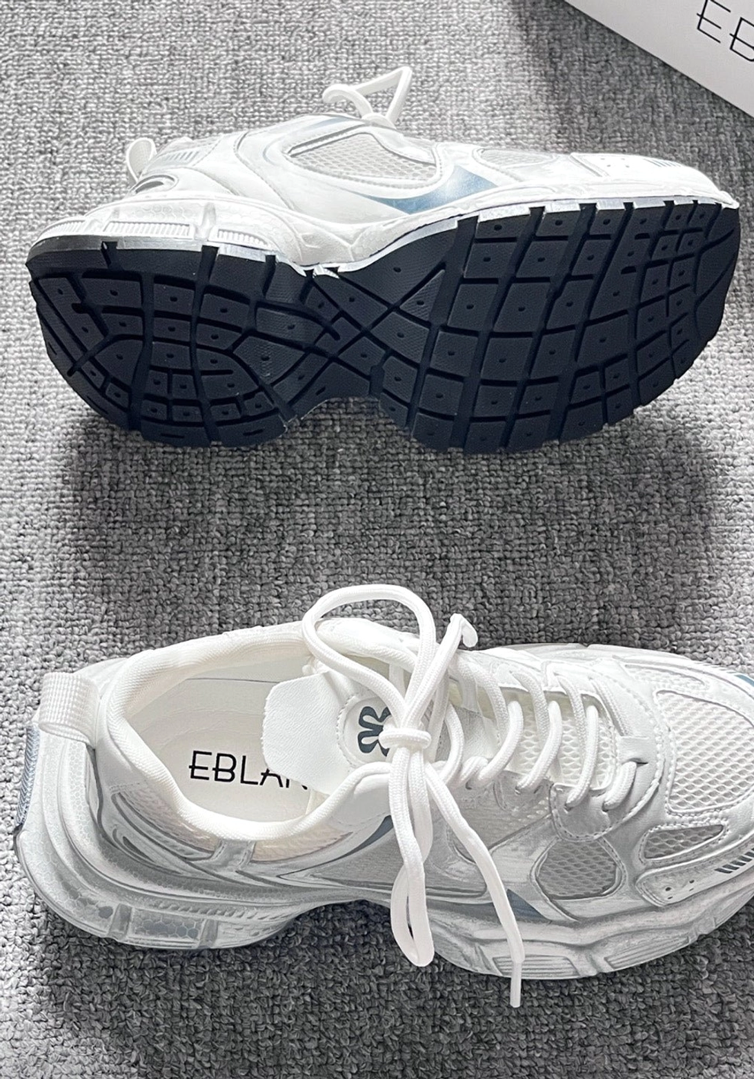 Modern East Asian streetwear sneakers combining retro running design, metallic accents, and thick rubber outsole