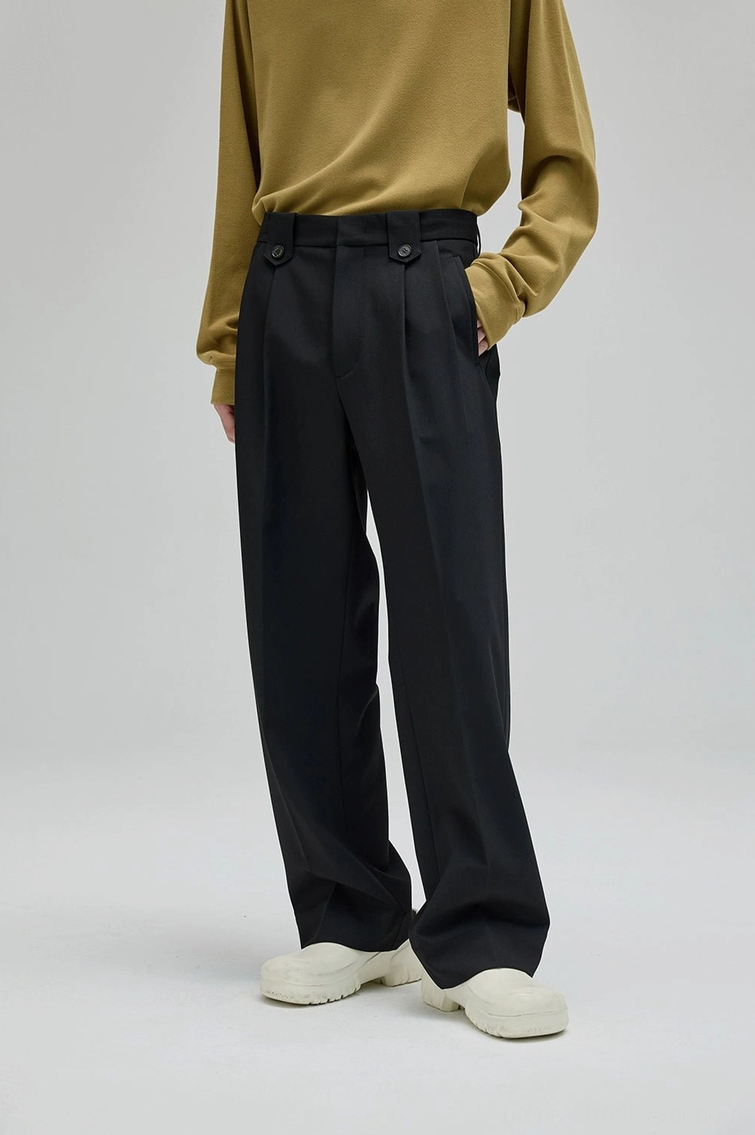Black wide leg suit pants with front pleats adjustable waistband and oversized streetwear silhouette